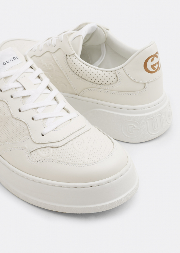 Embossed sneakers top